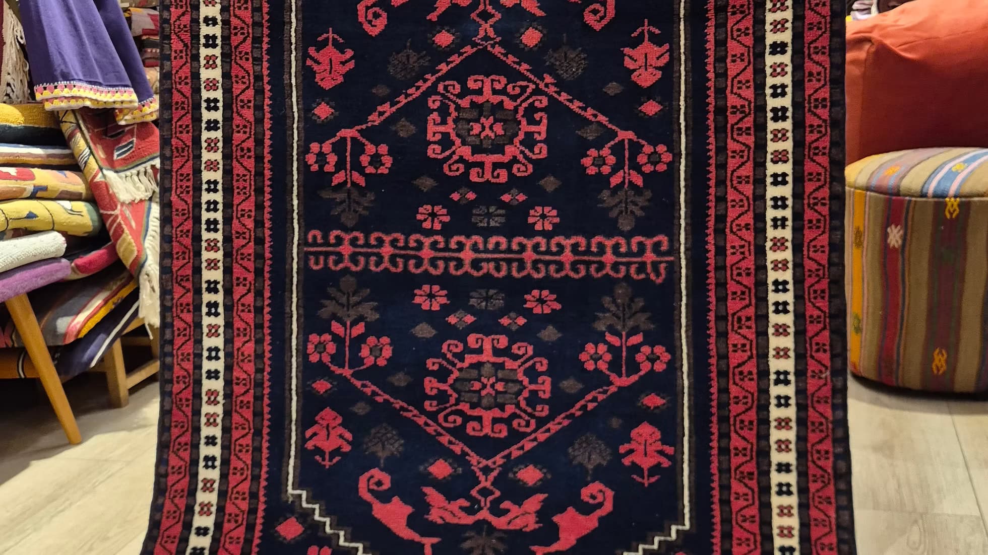 Close-up of dense wool and Gordes double-knot technique, emphasizing designer-quality craftsmanship