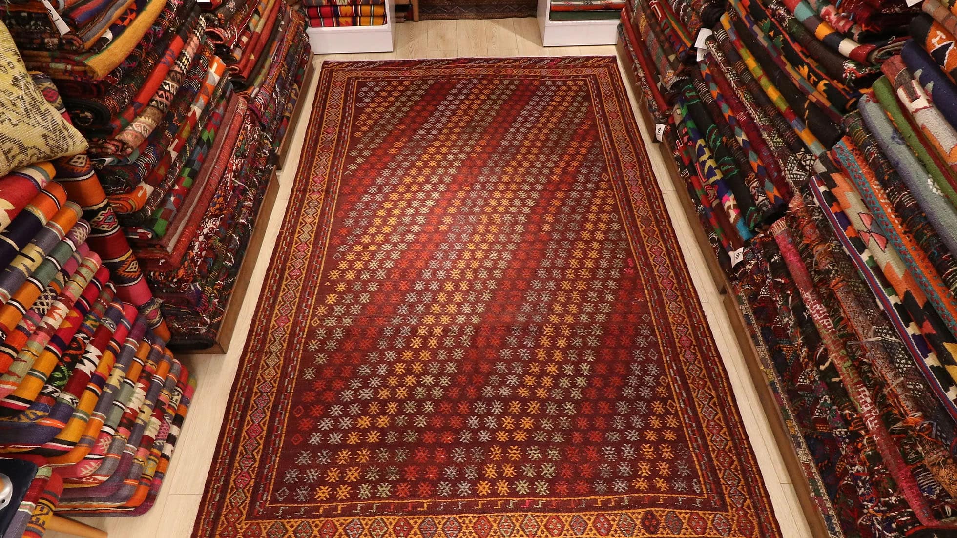 a majestic and rare Turkish flat oriental rug in red traditional motifs from Denizli