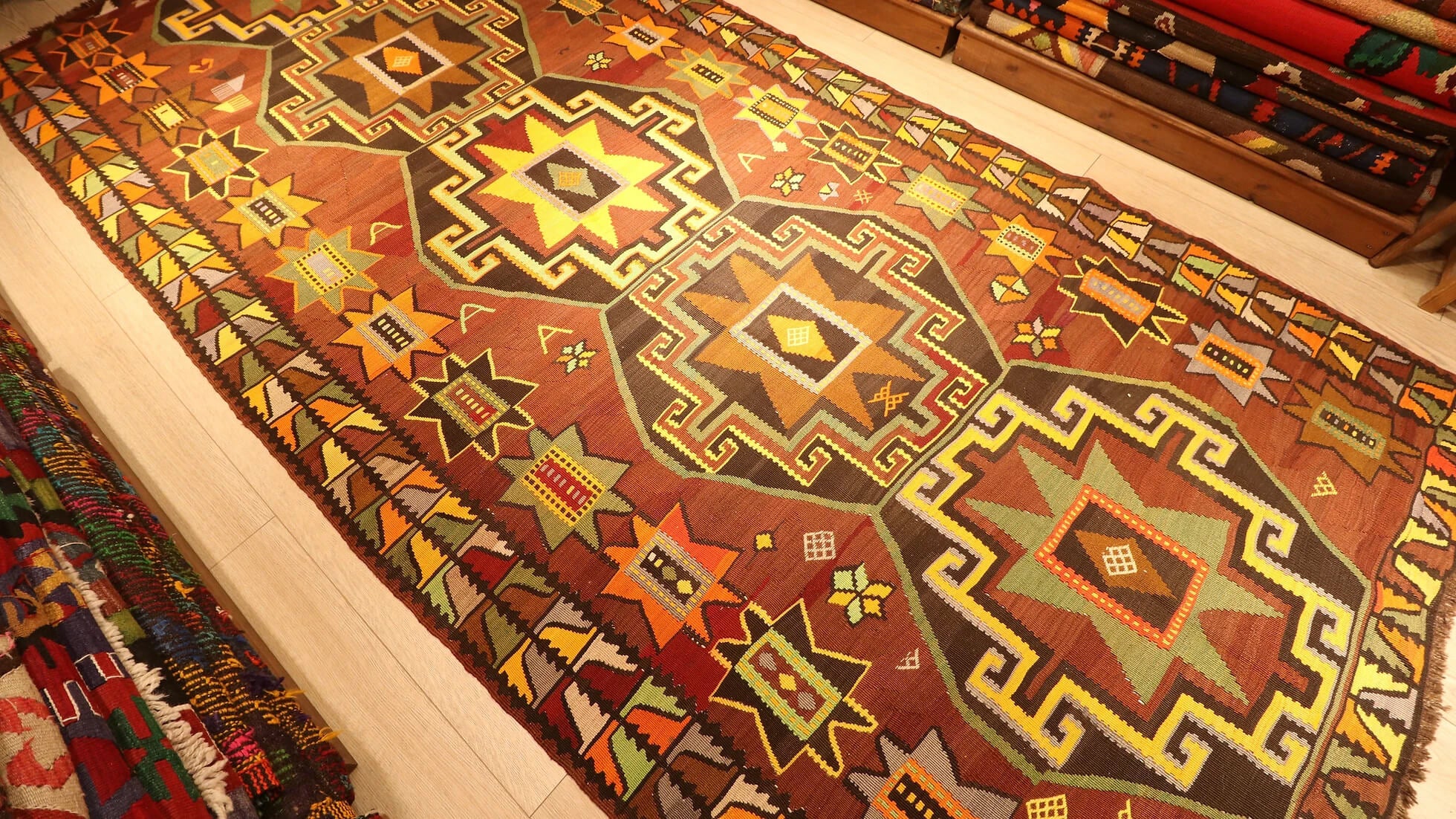 very rare Kars medallion Kurdish gallery runner rug signed by its local women weaver in muted earthy tones