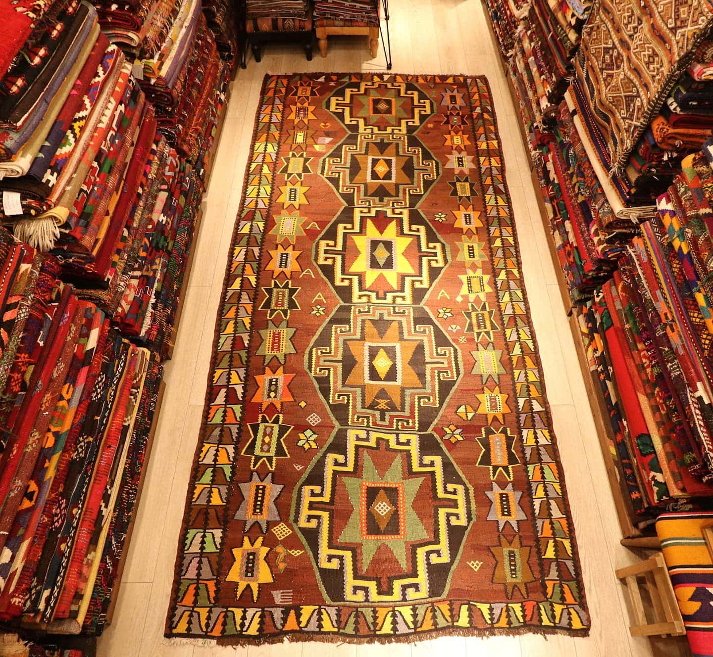 very rare Kars medallion Kurdish gallery runner rug signed by its local women weaver in muted earthy tones