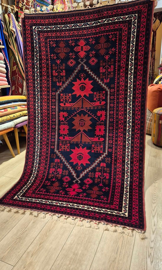 Authentic Turkish hand-knotted wool carpet with bold geometric pattern for refined interiors