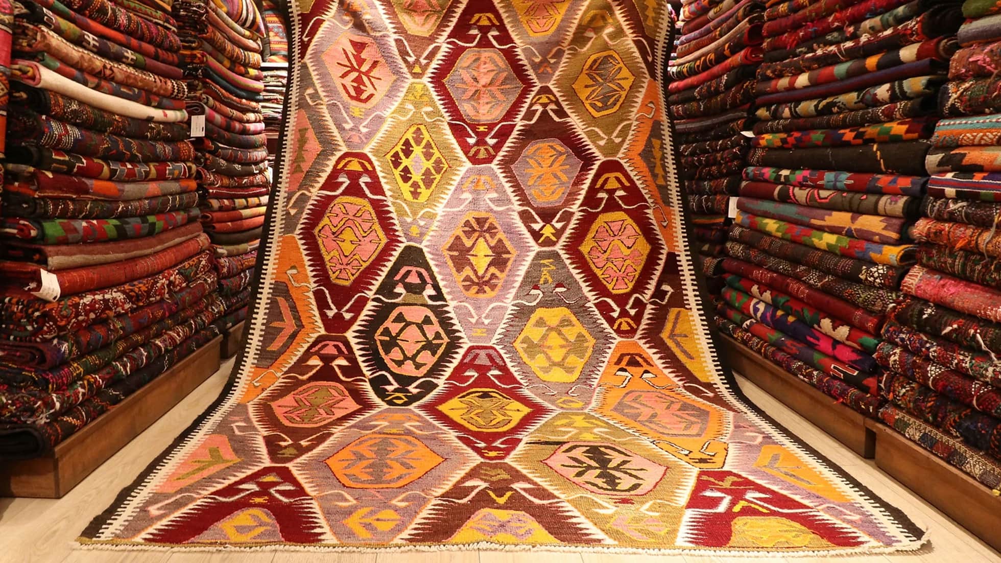 magnificent Turkish tribal kilim rug in pastel and rustic earthy colored medallions and traditional motifs from a vibrant mediterranean city Antalya