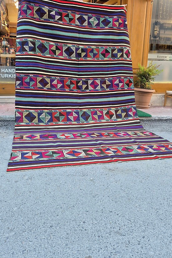 Handmade Anatolian flat-weave rug, 6x9 size, ideal for luxury interiors and set design