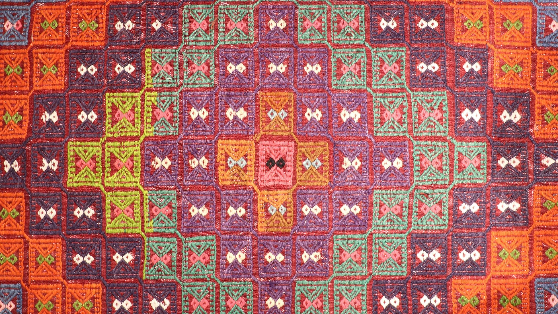 a very colorful vibrant and vivid handwoven cecim mid-century rug from Turkey by Kilim Couture New York