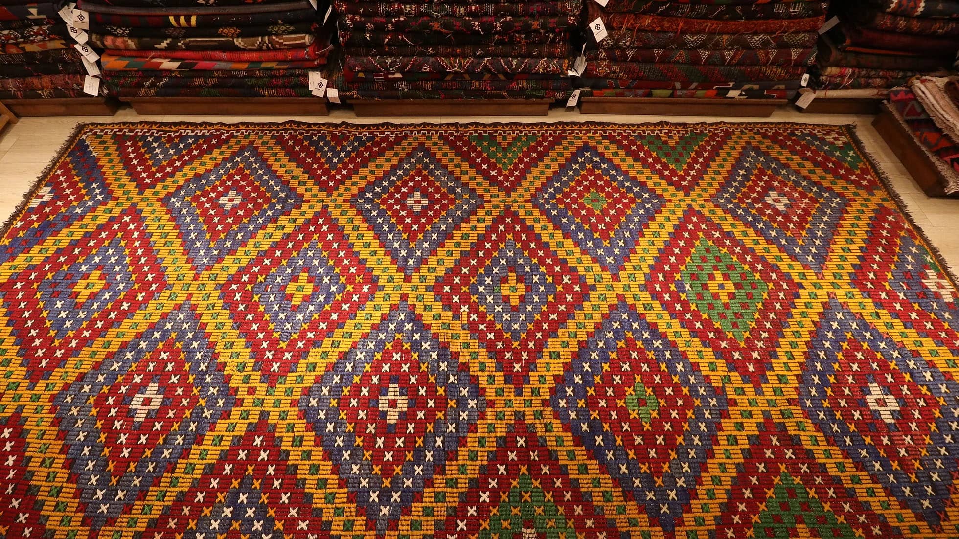 a very intricate and prestigious handwoven embroidered Kurdish runner rug from 1960s by KCNY