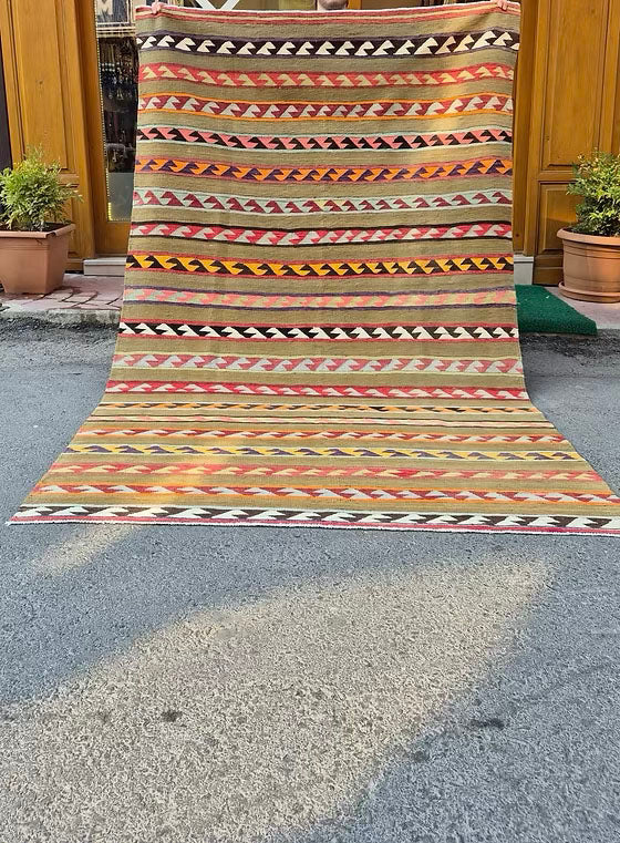 Vintage Turkish Balıkesir flat-weave kilim rug from 1930s, handwoven wool rug with tribal patterns and olive khaki ground