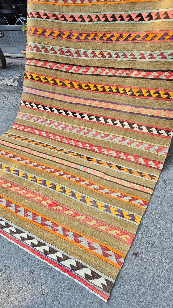 Nomadic Turkish kilim rug, handwoven in wool—ideal for modern organic living rooms, bohemian, rustic, or transitional interiors