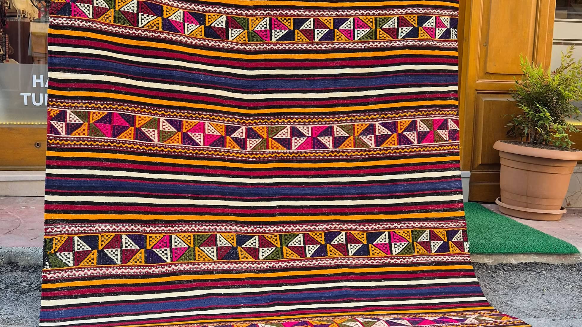 Kilim Couture New York rug store vintage flat-weave kilim with vibrant, organic rustic stripes.