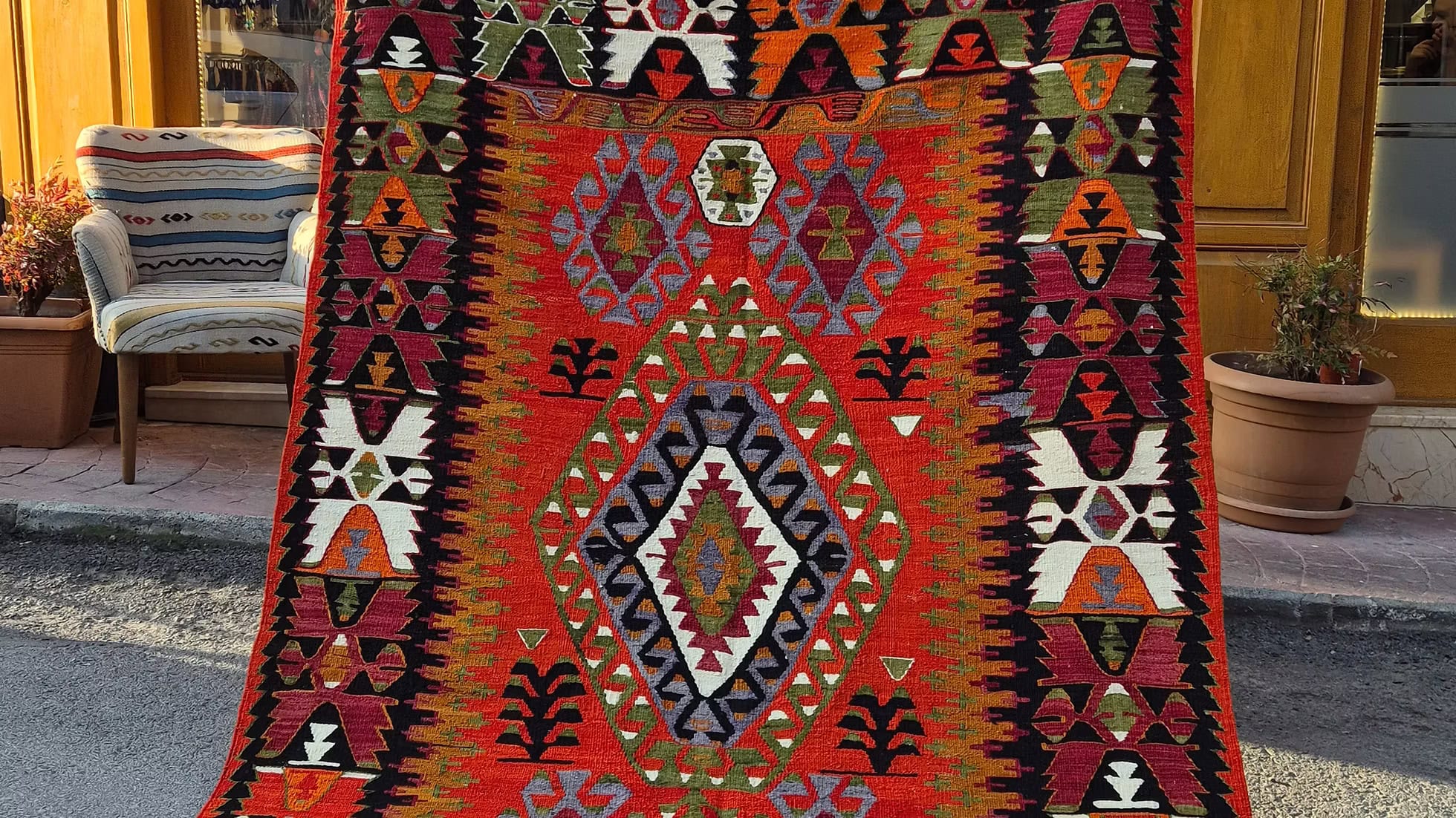 5x8 colorful patterned Turkish rug with geometric design by Kilim Couture New York Rug Showroom