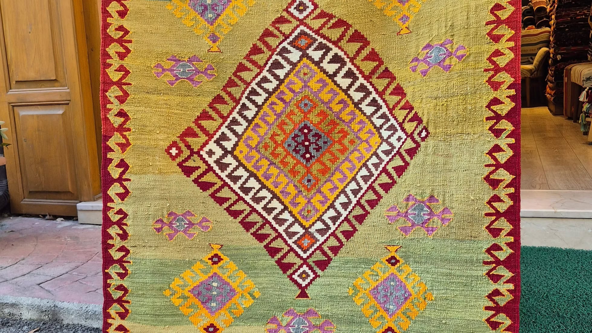 Colorful patterned Turkish medium area rug with geometric design