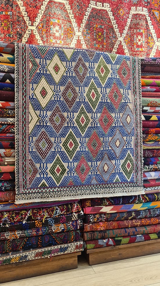 Handwoven 1950s Turkish Kilim Rug Featuring Burgundy and Geometric Eye Symbols