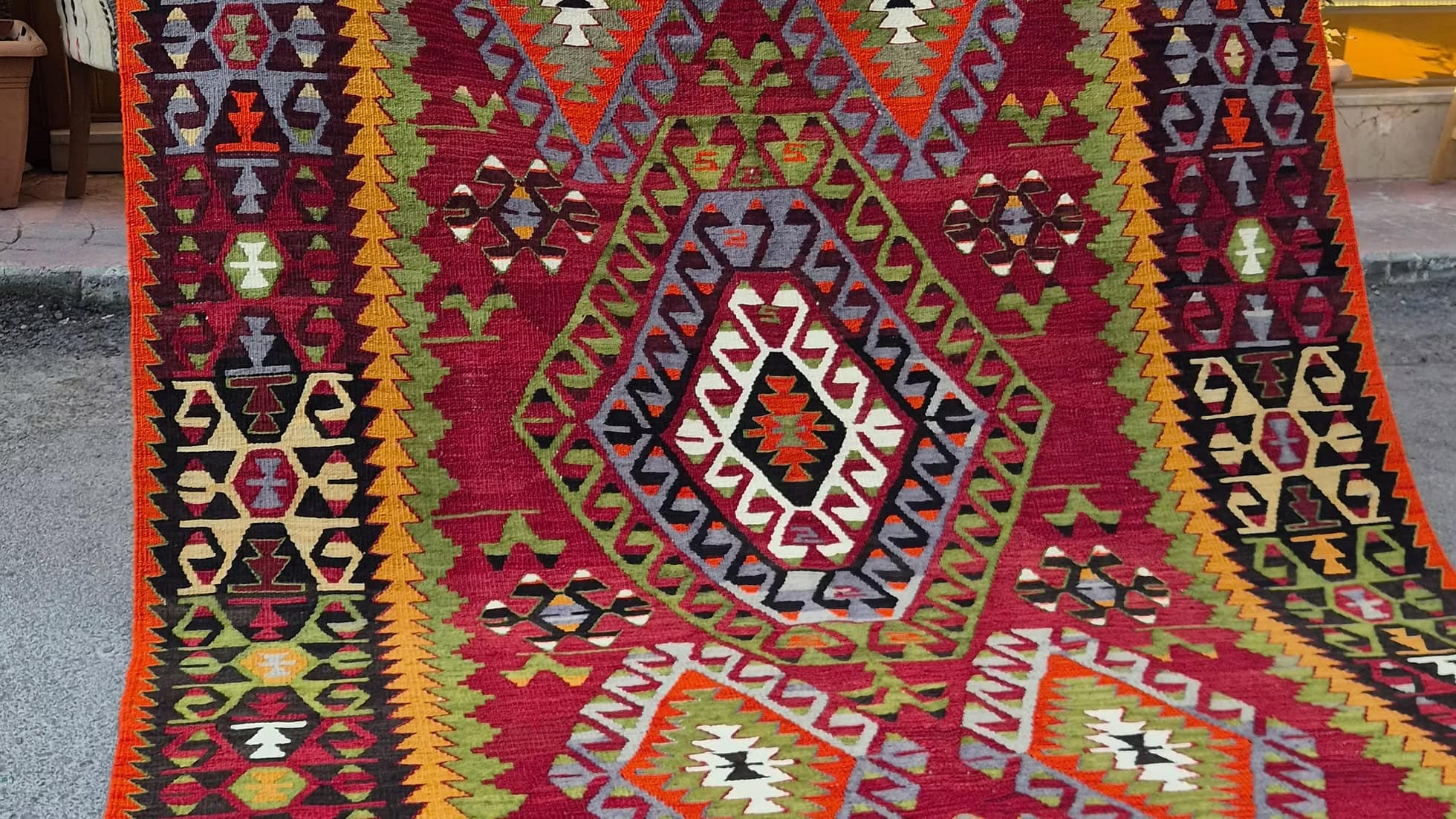 Mid-century red flat-weave rug with geometric pattern, designer area rug