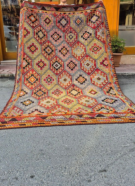 Decorative Turkish quilt rug with geometric pattern measuring 6x9