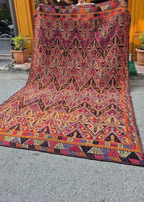 Designer Turkish Rug featuring bold geometric deisgn for interiors combining rustic charm and modern aesthetic for creative projects.