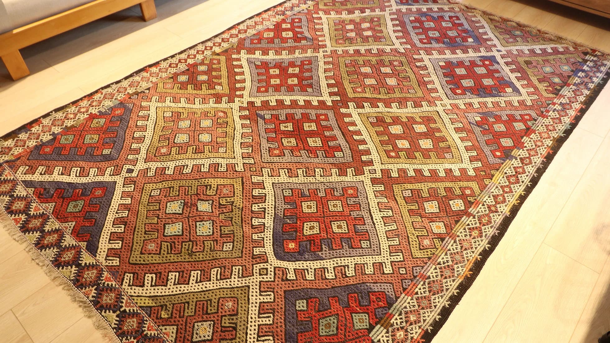 Vintage Turkish handwoven Konya Cecim Kilim from the 1940s, 6x9 ft, crafted with wool and cotton. Features earthy tones, intricate patterns, and traditional motifs, blending rustic elegance with timeless craftsmanship.