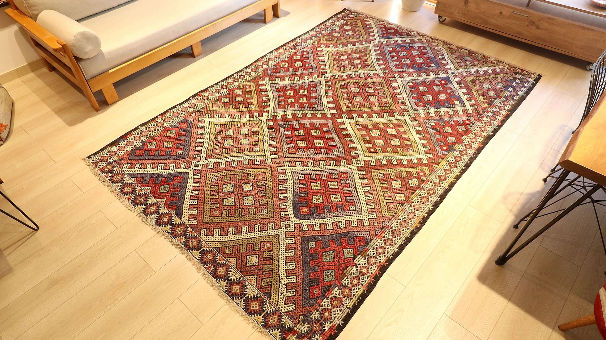 Vintage Turkish handwoven Konya Cecim Kilim from the 1940s, 6x9 ft, crafted with wool and cotton. Features earthy tones, intricate patterns, and traditional motifs, blending rustic elegance with timeless craftsmanship.