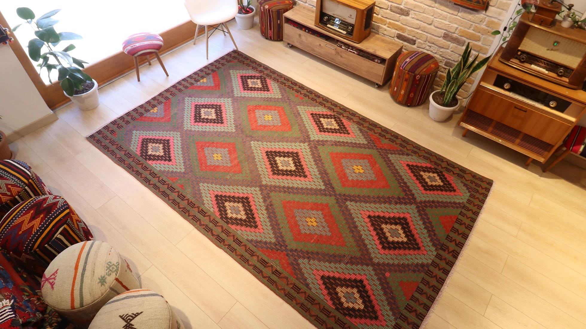 a very precious rustic Turkish cecim rug from weaver's hands in perfect condition and earth tones including pastel pink, pastel green, khaki, and orange