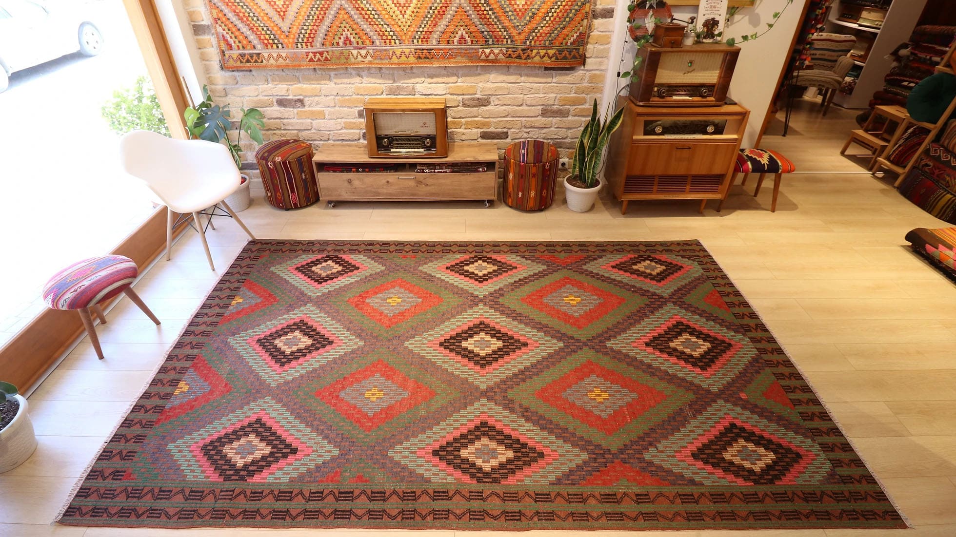 a very precious rustic Turkish cecim rug from weaver's hands in perfect condition and earth tones including pastel pink, pastel green, khaki, and orange