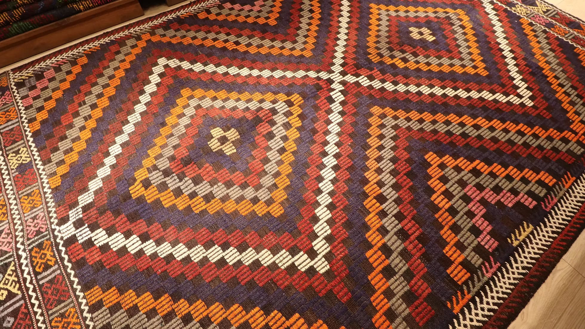 Close-up of a Turkish cecim patterned rug with geometric design