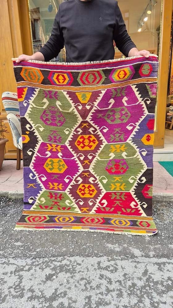 Vintage Turkish Barak Kilim with polychromatic hexagonal medallions and protective tribal motifs from the 1960s