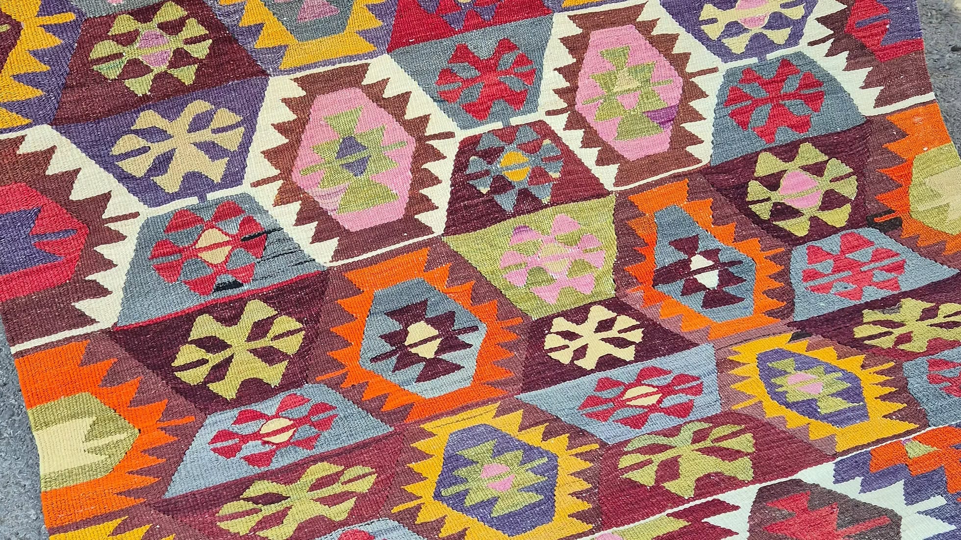 1960s vintage handwoven Turkish rustic rug with geometric motifs—mid-century flat-weave for living rooms or offices