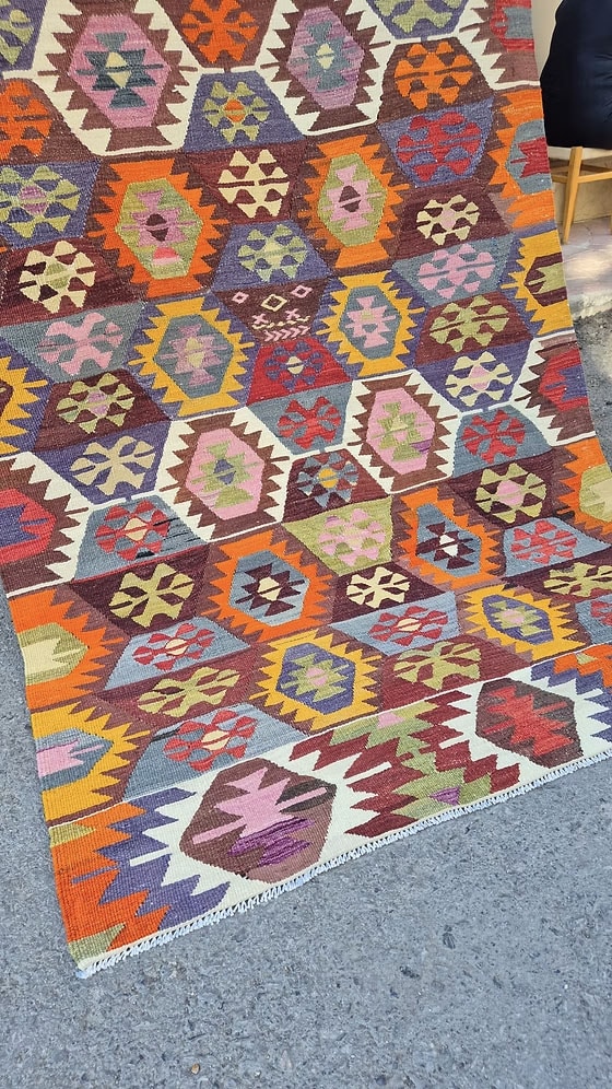 1960s vintage handwoven Turkish rustic rug with geometric motifs—mid-century flat-weave for living rooms or offices