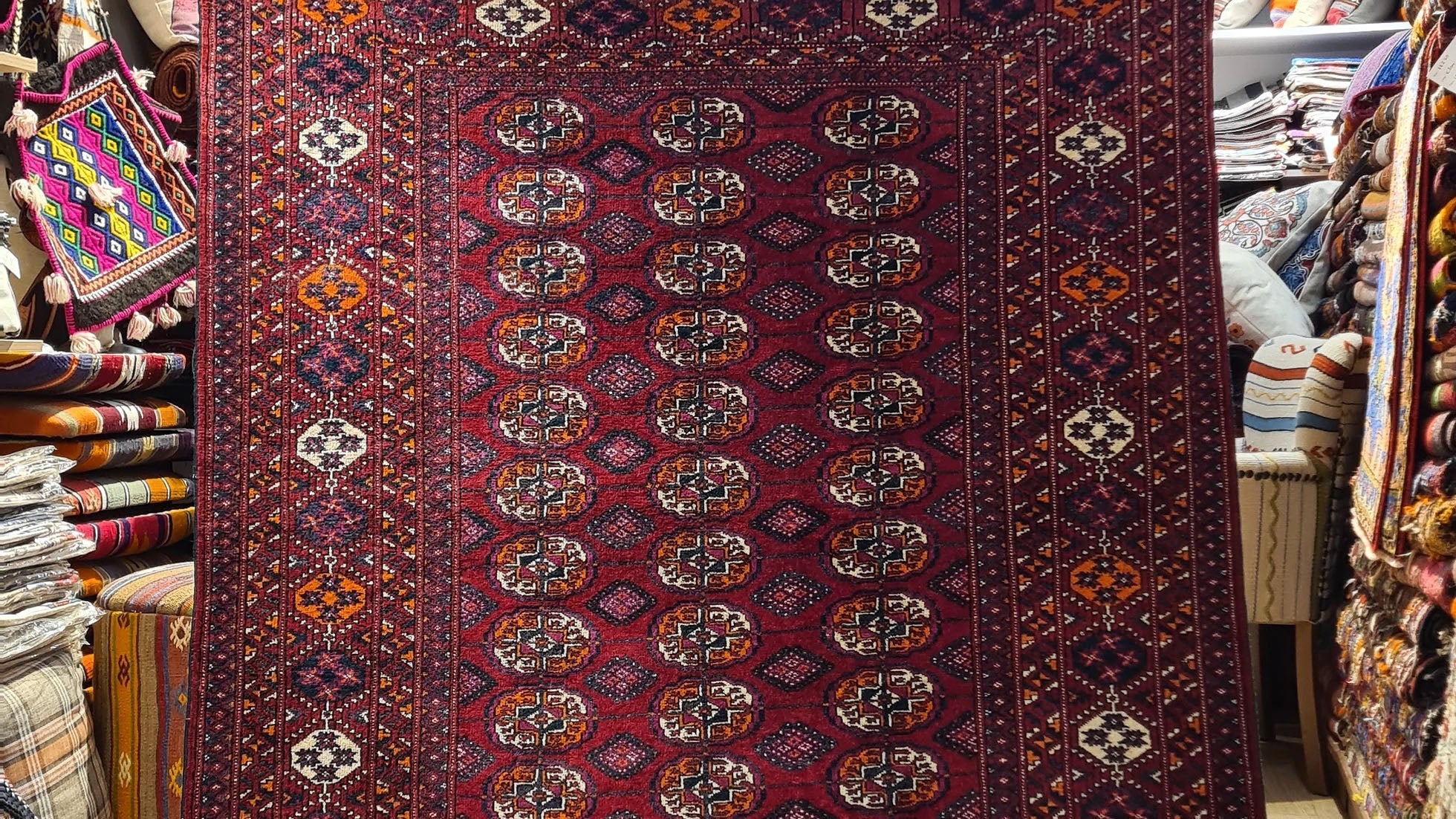 Vintage Turkmen Handwoven Bokhara Oriental Rug with Gul Medallions, 1960s – Handcrafted wool masterpiece in deep burgundy and ivory, available at Kilim Couture New York rug gallery